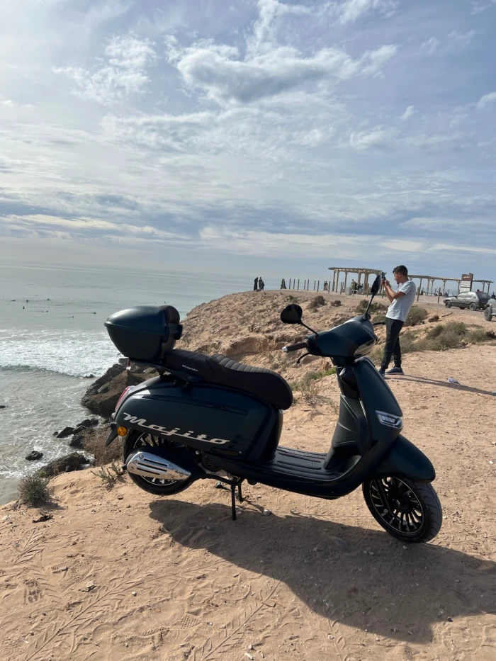 Rent a Surf Scooter in Taghazout with Board Rack & 2 Helmets 🛵🏄‍♂️ - motorcycles for rent in taghazout - RENTS.ma