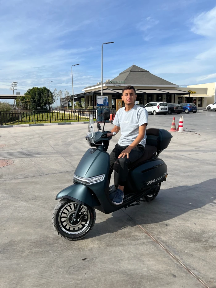 Rent a Surf Scooter in Taghazout with Board Rack & 2 Helmets 🛵🏄‍♂️ - motorcycles for rent in taghazout - RENTS.ma