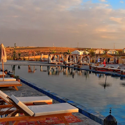 Luxury Day Pass: 3-Course Lunch with a Wide Epic Desert Pool + 1-Hour Quad Ride - book activity in marrakech - RENTS.ma
