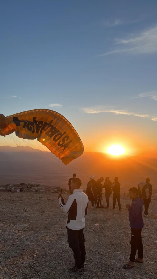 Paragliding with sunset in Agafay desert marrakech - book activity in marrakech - RENTS.ma